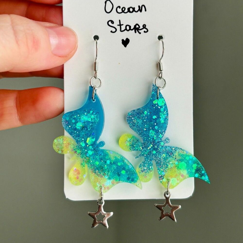 Blue Butterfly Earrings with Star Charms, Glitter Resin Dangles, Nature Jewelry